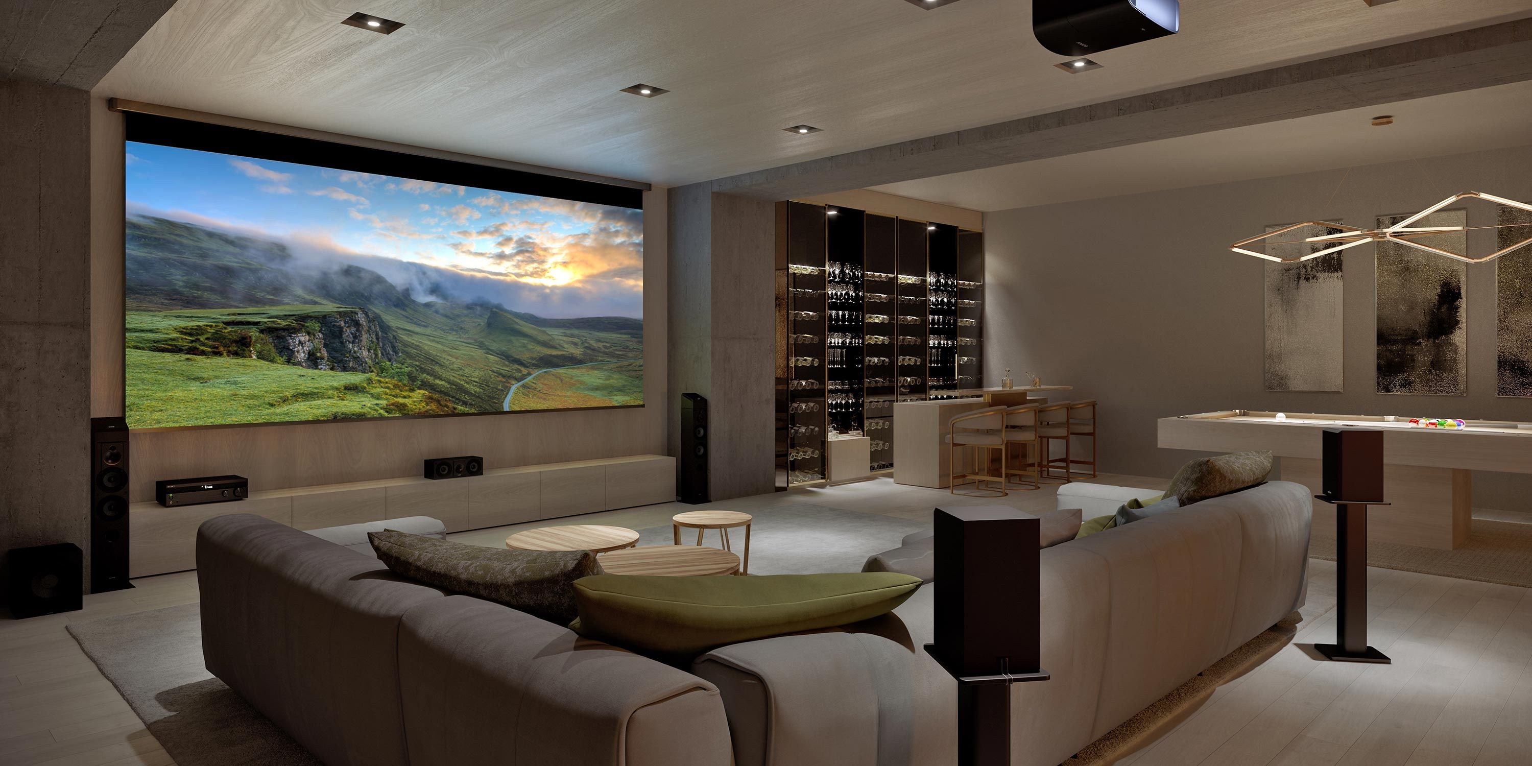 A sleek entertainment room featuring a large projector screen, a pool table, and a well-stocked wine bar.