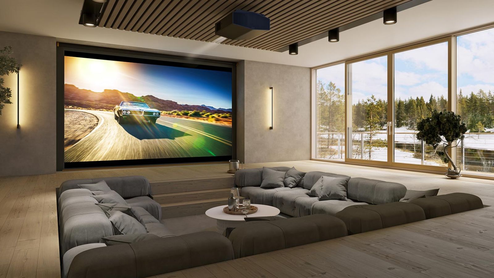 Stylish lounge with a built-in media wall and soft blue furniture facing a scenic TV display.